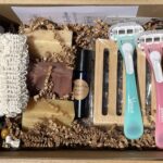 Shaving accessories, including bars of soap, soap saver, soap bag, and disposable razors.