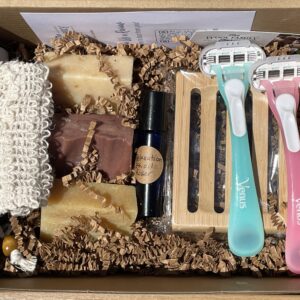 Shaving accessories, including bars of soap, soap saver, soap bag, and disposable razors.