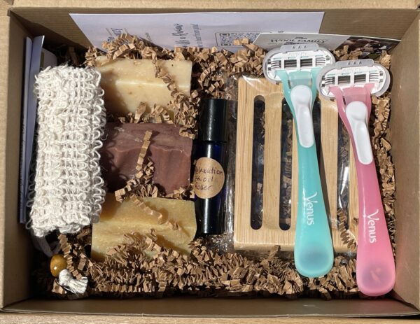 Shaving accessories, including bars of soap, soap saver, soap bag, and disposable razors.