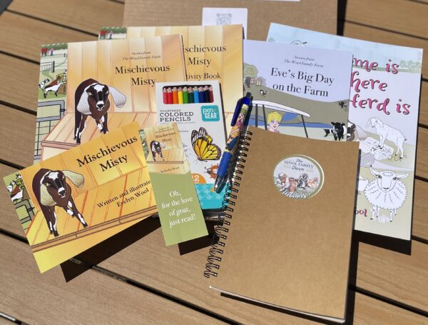 Book collection with bonus sketchbook, colored pencils, book mark, and post card.
